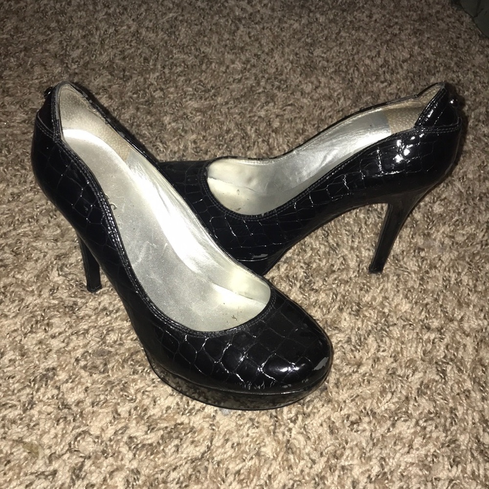 Faux snake/alligator skin black stilettos.